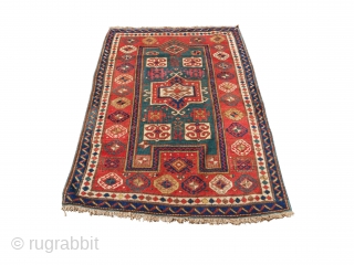 Beautiful and rare late 19th century green-background Fachralo rug. Green colour in wool requires two processes of dying: first yellow and then blue. This is why green is so rare in village  ...