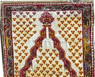 An Interesting Turkish prayer rug  measures 3' x 5'.                       