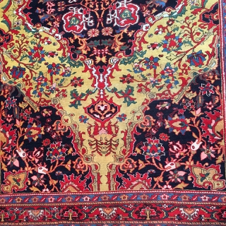 A Sensation gold ground early Persian Ferahan. measures 4'-4" x 6'-3".                      