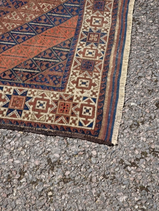 Symmetrically knotted Baluch / Balouch / Beluch rug with an unusual "tobacco" star border and a great field. In natural light you can see subtle abrash in the deep blues/greens and reds  ...
