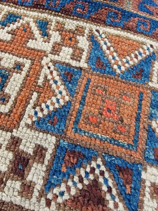Symmetrically knotted Baluch / Balouch / Beluch rug with an unusual "tobacco" star border and a great field. In natural light you can see subtle abrash in the deep blues/greens and reds  ...