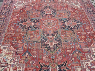 Heriz 378 x 299 cm., 12'5" x 9'9" , with some wear around the center. Heavy and tightly knotted piece, 52 kgs.           