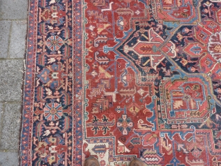 Heriz 378 x 299 cm., 12'5" x 9'9" , with some wear around the center. Heavy and tightly knotted piece, 52 kgs.           