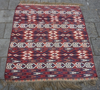 Antique Yomud Kilim, 134 c 123 cm., 4' 4" x 4'. Natural dyes and a hot red, but without colour transfer. Good condition, except for a finger tip seize hole ( see  ...