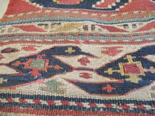 This end of the 19th century Shirvan Kilim #8031 rug measures 2’9” X 3’4”. It has red and white stripes. The ivory stripes are woven in Sumac motif. The red stripes are  ...