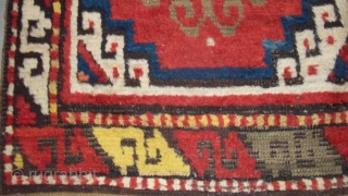 This circa 1875 Caucasian Kazak rug #7283 measures 3’9” X 6’6”. It has the Mogan motif in red and blue with ivory negative spaces. It has one narrow border with the lazy  ...