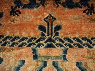 This Ningxia Chinese #7273 Oriental rug measures 6’3” x 9’2”. It has 9 five toed dragons in blue on an orange gold ground. Sacred mountain meditation points quarter the rug and are  ...