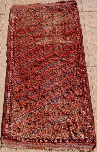 An antique Ersari-Beshir small main carpet, Buchara Oasis, circa 1880, 230 x 120 cm. Unusual design with a lattice of diagonal placed poppy flowers on a purple red ground. Nice sea-green and  ...