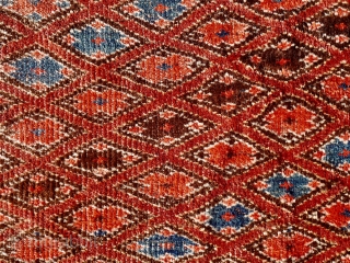 An antique Ersari-Beshir small main carpet, Buchara Oasis, circa 1880, 230 x 120 cm. Unusual design with a lattice of diagonal placed poppy flowers on a purple red ground. Nice sea-green and  ...