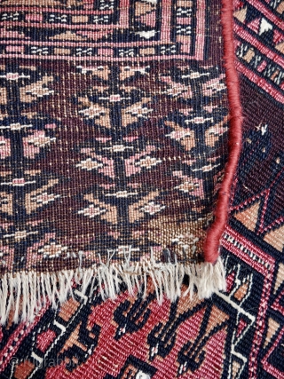 An antique part silk Saryk chuval, 165 x 89 cm. ( 5.4ft x 2.9ft) circa 1880. The dark purple-brown ground with Salor Guls. Each Gul inlaid with magenta silk and white cotton  ...