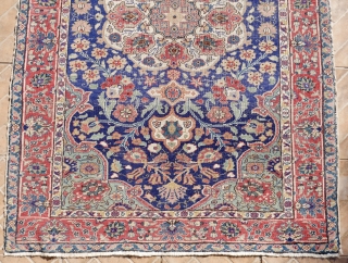 Antique Medallion Ushak/Oushak rug, 172 x 118 cm. (5.6ft x 3.9ft) Around 1900. The design with a small star medallion, extended into a larger blossoming one. The dark indigo field with a  ...