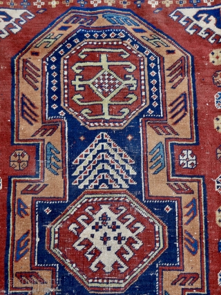 A Baku Surahani Garden rug, 126 x 174 cm. early 20 th. C. The design represents a bird's eye view of a walled garden with central trees, flanked by two octagonal fountains  ...