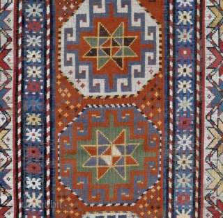 An antique Genje long rug with Memling (Moghan) Guls. 120 x 296 cm. late 19 th. century.  This design with hooked octagons is a very old design, dating back to the  ...