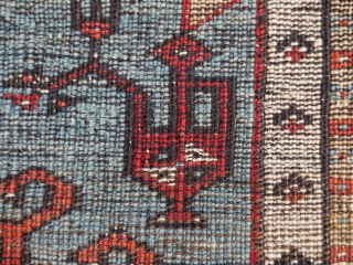 A quintessential Ladik Prayer rug, central Anatolia, 184 x 110 cm. before 1850. The lower compartment with typical rows of tulips facing downwards. Main border with rosettes and diagonal placed tulips. Condition:  ...