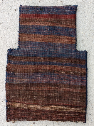  A finely woven Kurd Soumak saltbag, circa 1930 or before, has a beautiful range of natural dyes with a beautifully multi-colored back. In excellent condition, size 1" by 1'5"   