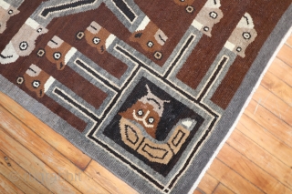 Antique mysterious rug.  Not sure whats going on with this one.  Unusual!  I think maybe a khotan.  Seems to have a new solid grey border woven.   