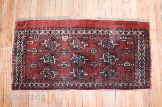 Antique Turkoman with an inscription.  Size is 2'x4'.  Has a repair.                    