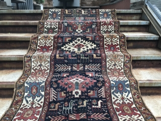 Shahsavan ? North west Persian? Intriguing long rug. Cool animal motifs. Great condition by my standards and by age, of course.            