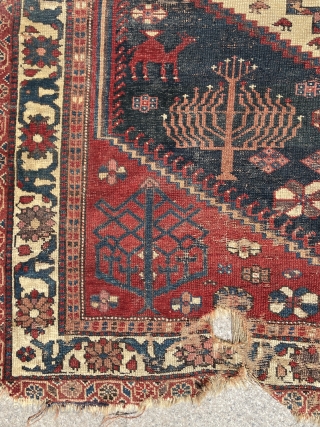 A very rare jewish carpet decorated with a jewish candlestick on all four corners… circa 1800s                 