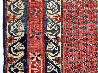 Antique Caucasian kuba or seichour rug. Unusual field design and iconic “running dog” borders. Overall good condition for the age with mostly even low pile. I see what looks like a small  ...
