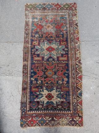 Rare, fine, and colorful, antique Lesghi rug fragment ( 172 cm. x 80 cm.)
Condition visible on pictures back and front. Unfortunates reweavings in the black, but considering the overall condition it's a  ...