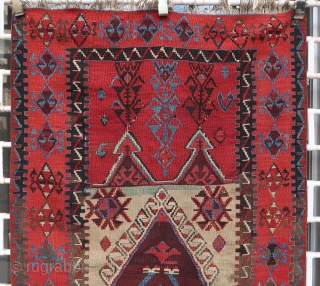 Old and beautiful Konya area "Tulip" kilim (179 cm x 102 cm). Very good dyes, with an especially shimmering red. Good condition for its age, 2 small repairs in the upper corners.  ...