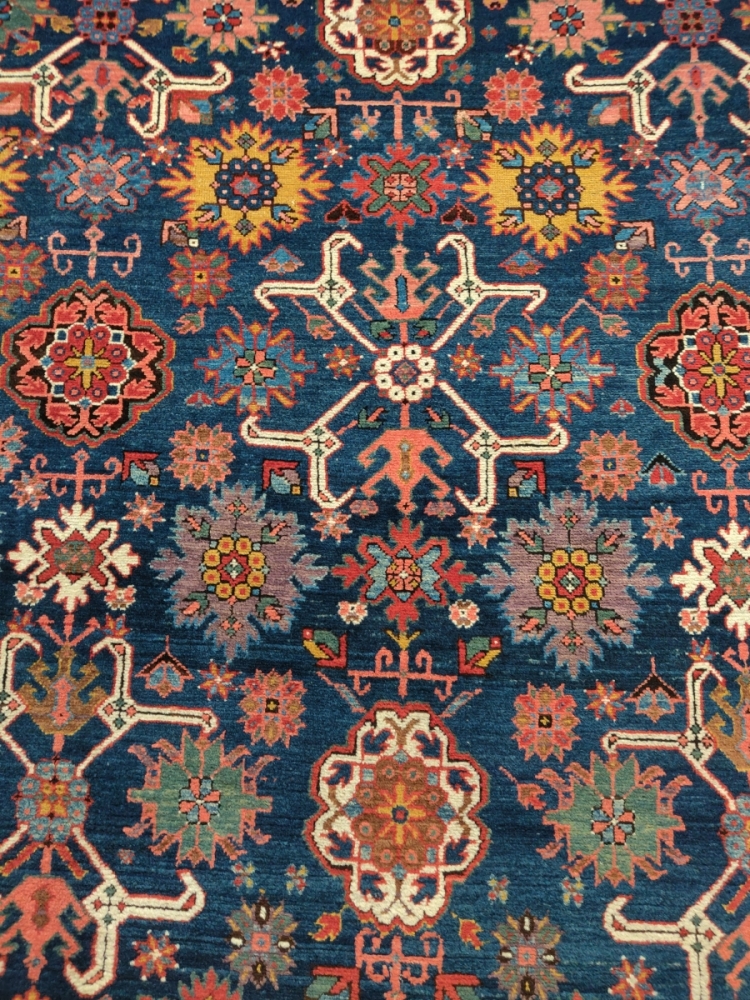 Sadegh Memarian's colorful Caucasian kelleh carpet