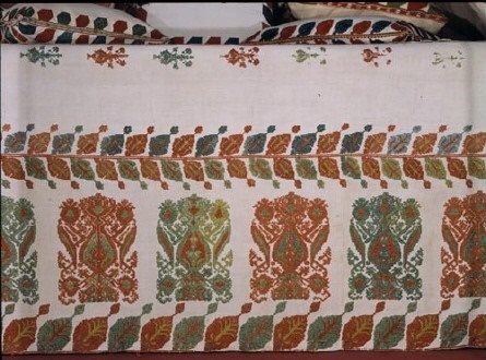 Valance of a bed, decorated with stylised designs of flowers, flowerpots and leaves, rendered in the distinctive raised technique unique to Rhodos, a Dodecanese island. 18th-19th c. (ΓΕ 6609) image and text copyright Benaki Museum