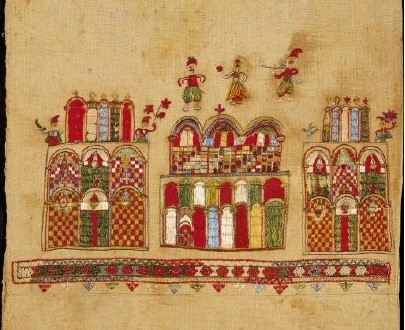 Bridal cushion from Skyros island with a scene containing three monumental structures on which human figures are depicted. The structure in the middle is surmounted with a miniature scene of a wedding, the bridal couple and a musician. 18th c. 0.44x0.43 m. (ΓΕ 6390) image and text copyright Benaki Museum