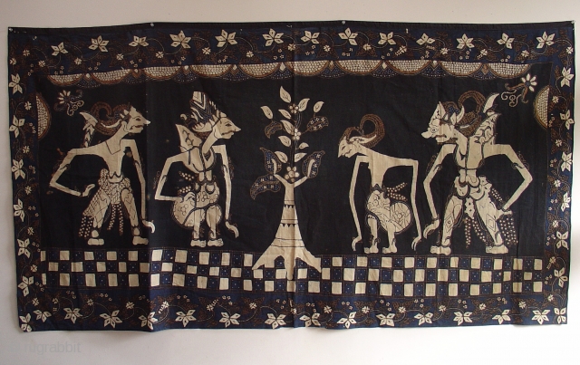 Handsome Wayang Batik from Java: Circa 1925. Good condition with a couple of small holes and light fading on one side. Deep indigo.          