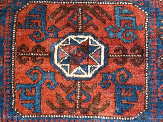 Fine Belouchi Bagface, 19th century, 73cm x 70cm 2'4" x 2'3". This bag has wonderful wool and good colour. Interesting 'totemic' motifs in central cartouche. Generally very good condition. The pile is  ...