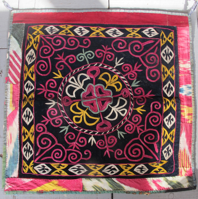 Immaculate Central Asian Embroidery, Khirgiz or Uzbek, with cosmic ornamentation. Silk embroidery on velvet. Lined. The dimensions are 48cm x 50cm. 
www.aaronnejad.com.           