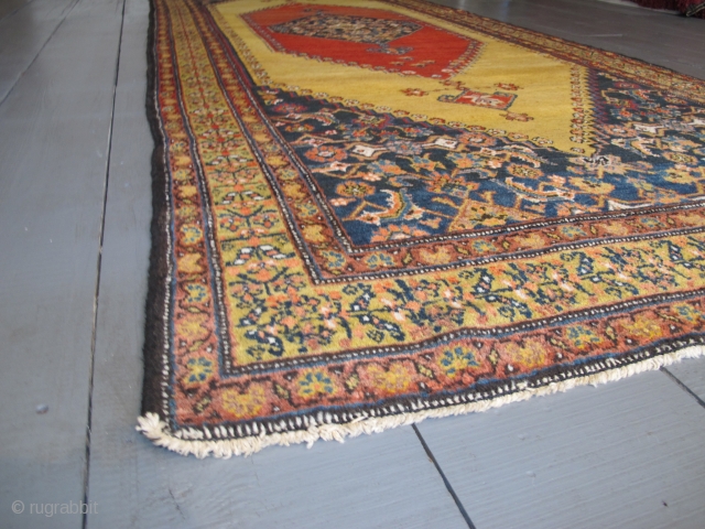 Kurdish Long Rug, 4.00m x 1.51m, dated circa 1910 (1230). Stunning saffron yellow field. Excellent condition.                 