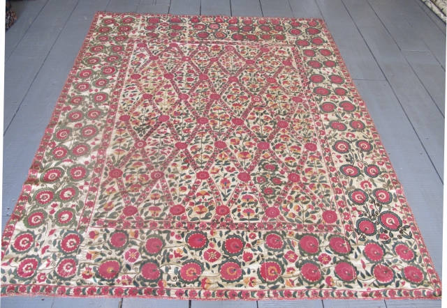 An Uratube Suzani, circa 1850, 2.32m x 1.84m (7'8" x 6'), wonderful colours. Beautiful lattice design. Very good condition. Please contact me for further details.        