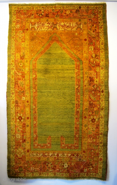 19th century Ushak Prayer Rug 2.14m x 1.23m (7'1" x 4'), wonderful fleecy Angora wool, silky texture. Great architectural drawing with inscription above the cartouche. Very good condition, with very minor restoration.  ...