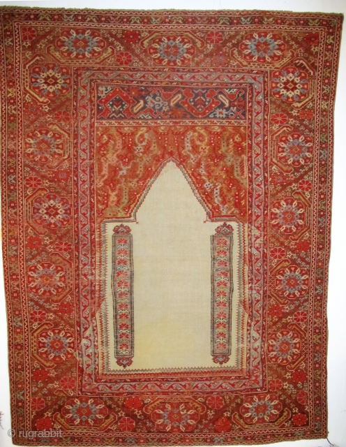 Giordes Prayer Rug, 1.71m x 1.28m, circa 1700, or earlier. Beautifully drawn elements, the design is perfectly balanced. Rare white field, funky spandrels and a really pretty main border. Note the lazy  ...