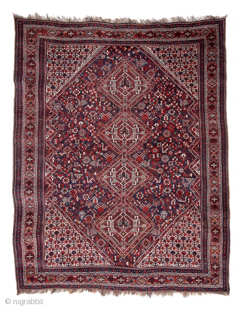 Qashqai rug, first quarter 20th century, 280 x 220 cm (111” x 86,5”)

The four medallions feature the “Qashqai Emblem”. The midnight blue field shows the classic array of stylized birds with different  ...