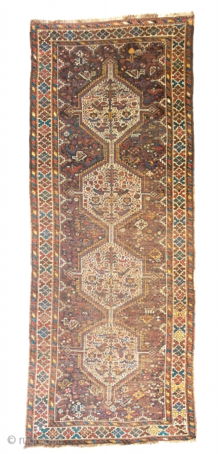 Khamseh rug, first quarter 20th century, 260 x 103 cm (102” x 40,5”)
South Persia Tribal

A rug woven by members of the Khamseh Arab tribe, with the classic line of medallions enclosed by  ...