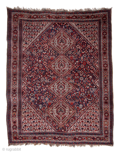 Qashqai rug, first quarter 20th century, 280 x 220 cm (111” x 86,5”)

The four medallions feature the “Qashqai Emblem”. The midnight blue field shows the classic array of stylized birds with different  ...