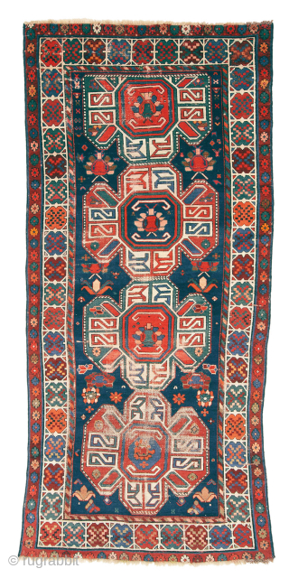Kazak rug, late 19th century/early 20th century, 254 x 117 cm (100” x 46”)

Kazak Lenkoran, showing characteristic “cross” motifs, saturated and nice colors.
Condition: low pile all around, some foundations, old small repairs,  ...