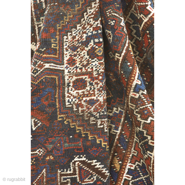 Khamseh rug, first quarter 20th century, 260 x 103 cm (102” x 40,5”)
South Persia Tribal

A rug woven by members of the Khamseh Arab tribe, with the classic line of medallions enclosed by  ...