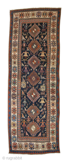 Antique Caucasian Gendje Rug With Persons, late 19th century
319 cm x 114 cm
An extraordinary rare, charming, collectible and decorative tribal antique rug from Gendje, in the Central Caucasus. It transmits a festive ...