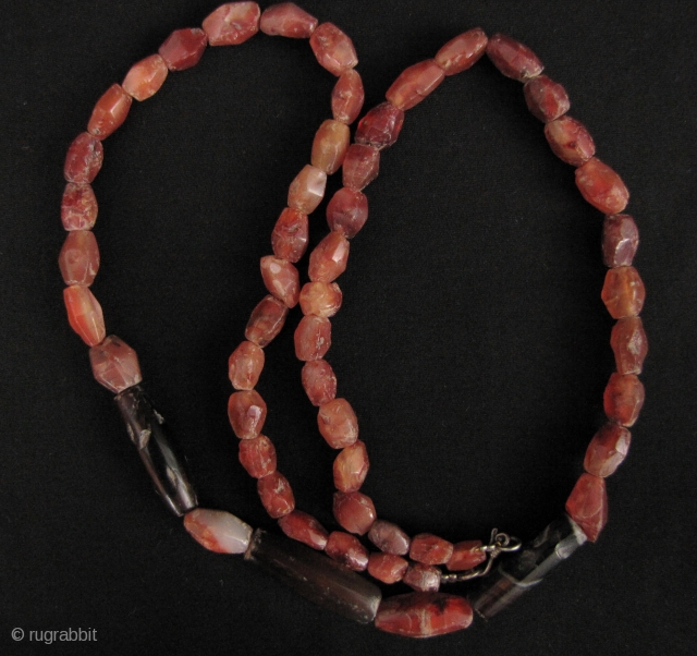 
Nice strand of Bronze Age, circa 2000 to 3000 year old, faceted and totally tubular agate beads. These were excavated from Sukhothai Province in north central Thailand, please see enlargements for scale  ...