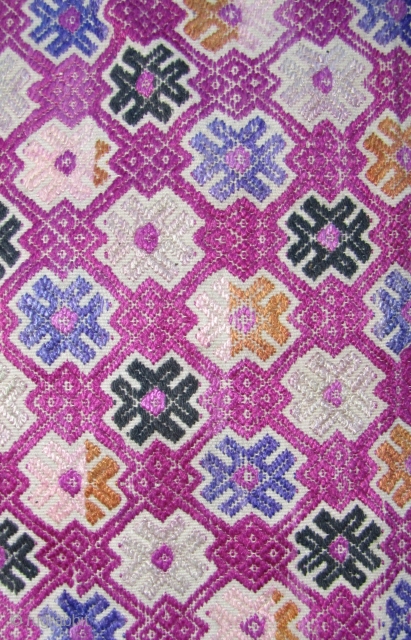 Bouyi Wedding Blanket 

Fine three panel wedding blanket from the Bouyi (Buyi) ethnic group Libo County, Guizhou, China. The supplementary weft “well” patterned embroidery is silk except for the black medallions- the  ...
