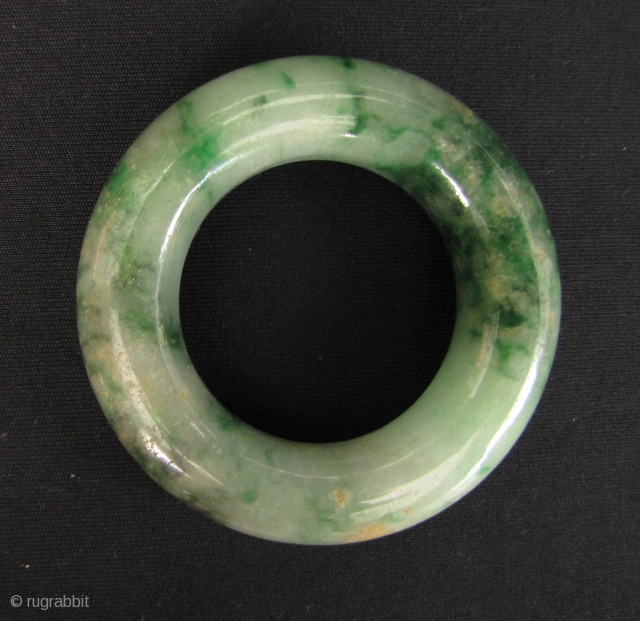 Nice vintage jadeite bangle circa 40 to 70 years old. Some tiny scratches on the surface but no cracks. Unusually small size perhaps made as a “symbolic protective” gift for an infant,  ...