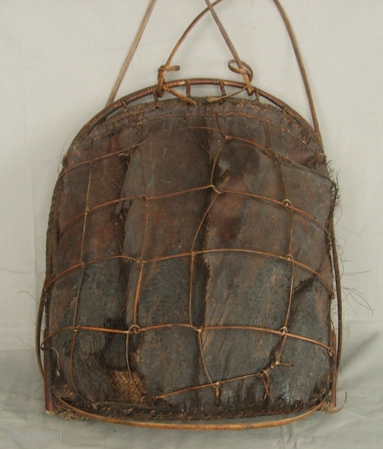 India, Himalayas: Fine and rare old rattan “tali” basket with a contracted mouth from the Idu Mishmi ethnic group of Arunachal Pradesh, India. In India they are primarily animist but in China  ...