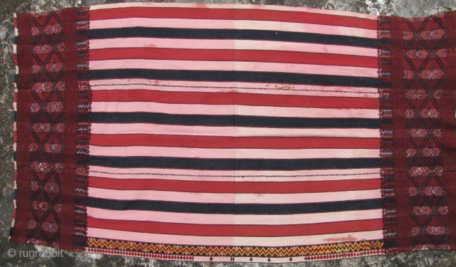 Kachin Skirt: Rare woman’s skirt (pukhang) from the Kachin/Jingpo ethnic group, Northeast Burma. This is two panels with supplementary weft trim on the ends made of dog hair. Mostly natural dye and  ...