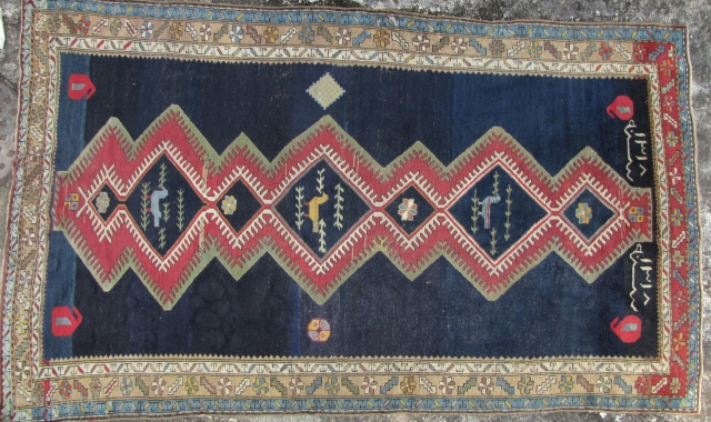 Lovely Gabbeh rug dated 1940 according to the 1318 Persian Jalali calendar, all natural dyes. Good condition all natural dyes. L: 237cm/93in and W: 133cm/52in. A few old repairs.

http://www.abhayaasianantiques.com/items/1417654/Iran-Tribal-Rug    