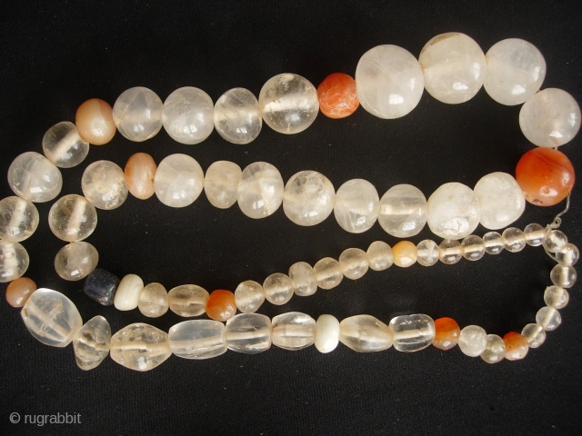 


South East Asian: Fine strand of quartz crystal beads (and a few carnelians) excavated from the Tak Burial site near Mae Sot along the Thai/Burmese border. These can be reliable dated to  ...