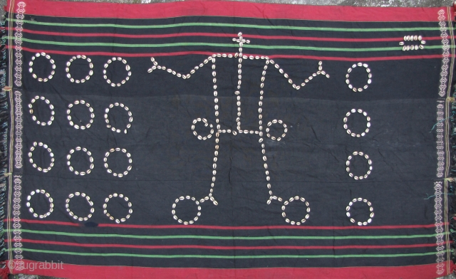 
Naga Blanket with Cowrie Shells: 
Fine, old and rare Chang Naga, three paneled body “prestige” cloth with anthropomorphic cowry shell design. The cloth may have been woven by the Meitei of the  ...